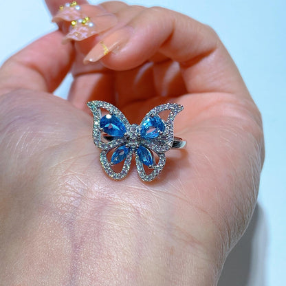 186【BETXEU】S925 Topaz blue butterfly ring Adjustable